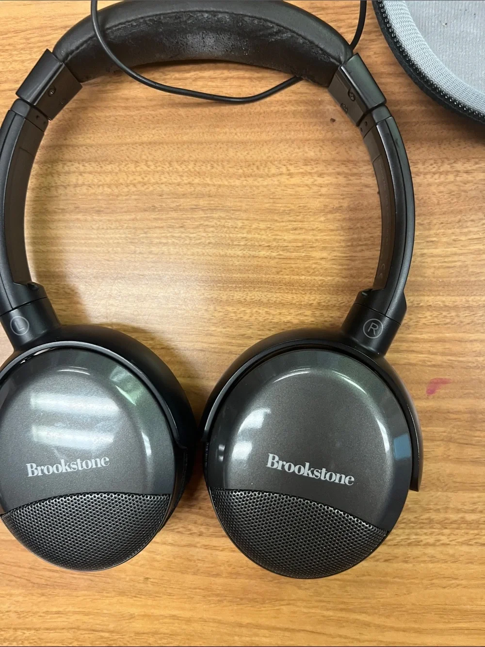 Brookstone Silver and Black On-Ear Noise-Cancelling Headphones with Case